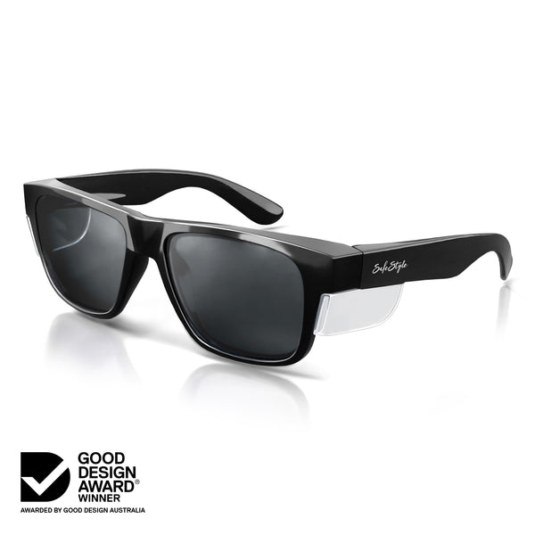 Fusions safety glasses with black frame and tinted lens, shown at an angle