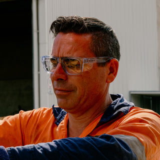 Fusions XL safety glasses, front view, blue frame and clear lens