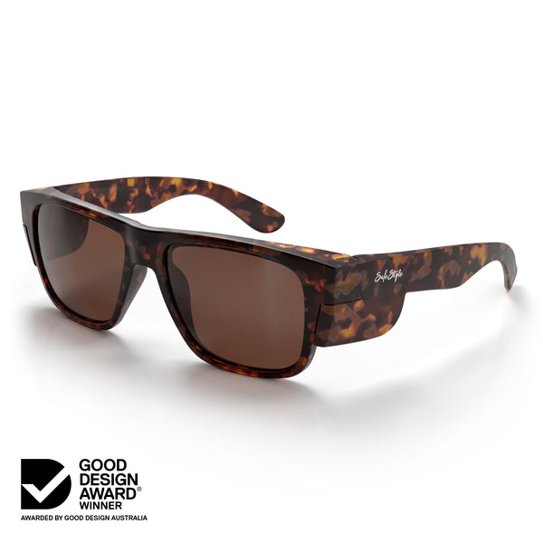 Fusions safety glasses with matte brown tort frame and brown polarised lens at an angle