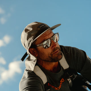 Fusions safety glasses with graphite frame and mirror chrome lens, angled view