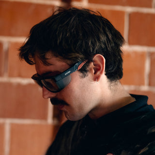 Converts Matte Graphite/Red Frame Clear Lens